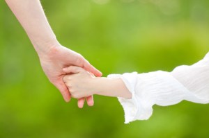 hands of mother and daughter